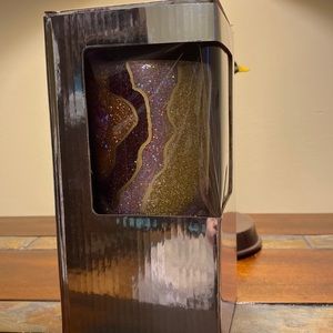 It is a handmade glitter tumbler